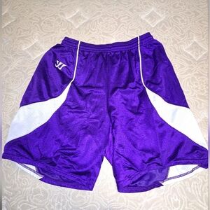 A pair of Warrior athletic shorts in a womens large. Purple and grey.